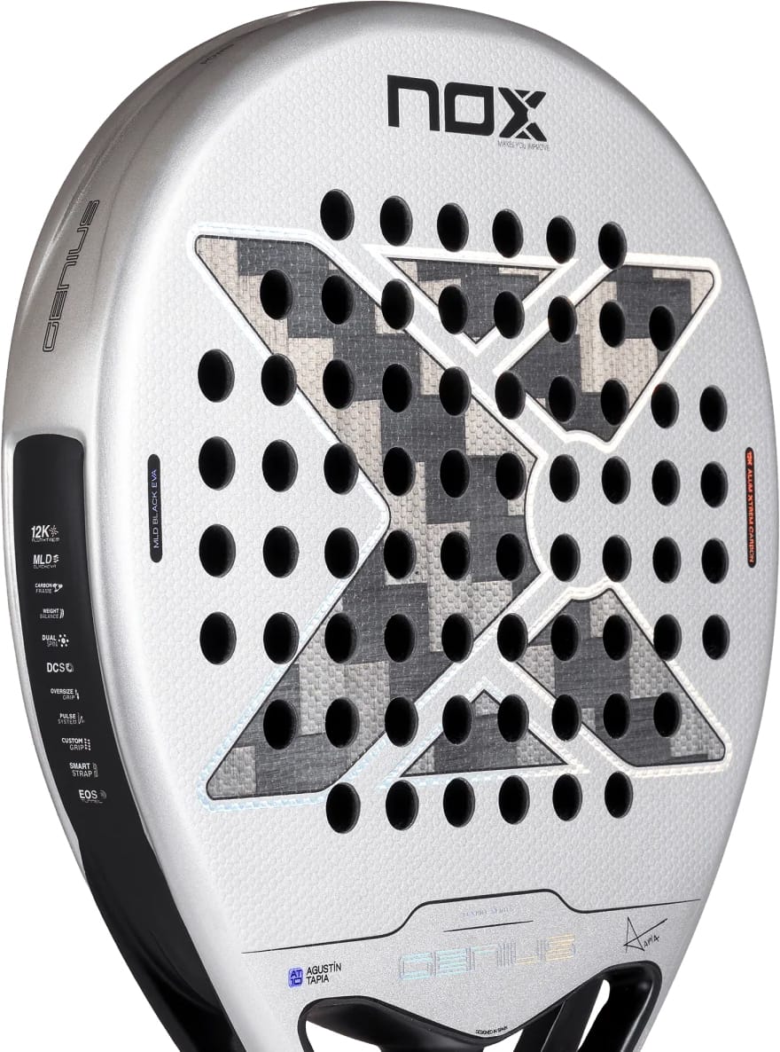 Silver and grey NOX AT10 Genius 12K Alum Xtrem By Agustín Tapia 2027 padel racket with a perforated surface, featuring a large black X pattern in the center and technical specification text printed along the side.