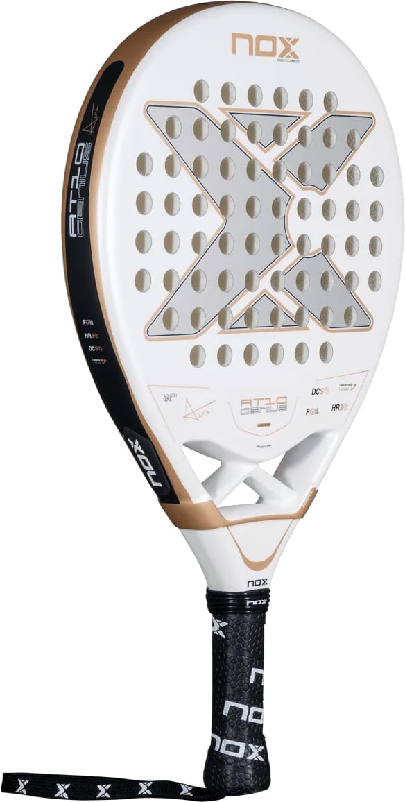 NOX AT10 Genius Junior 2026 padel racket in white with a teardrop-shaped head, gold accents, and a black grip featuring a repeating logo pattern.