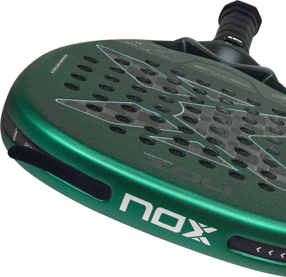 Dark green NOX Ventus Attack 12K Xtrem By Aimar Goñi 2027 padel racket with a perforated surface, a black handle, and weight balancing attachments on the side.