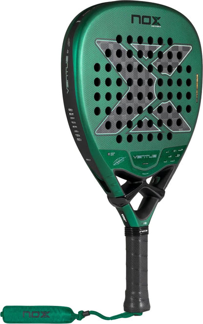 Teardrop-shaped NOX Ventus Attack 12K Xtrem By Aimar Goñi 2027 padel racket with a dark green face featuring a large X-pattern of perforations, a black handle, and a matching green wrist strap.