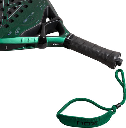 NOX Ventus Attack 12K Xtrem By Aimar Goñi 2027 padel racket in green and black, featuring a perforated surface, a textured black grip, and a matching green wrist strap.