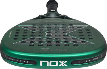 Teardrop-shaped NOX Ventus Attack 12K Xtrem By Aimar Goñi 2027 padel racket with a dark green frame, a large black X pattern across the face, and small circular perforations.