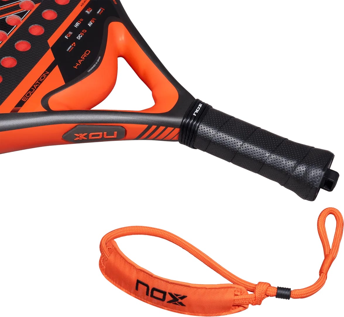 Black and orange NOX Equation Hard Advanced 2027 padel racket featuring 3K fibreglass, a perforated grip, and an orange wrist strap.