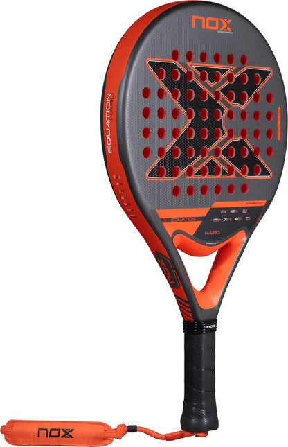A round, red and grey NOX Equation Hard Advanced 2027 padel racket with a black handle and a wrist strap.