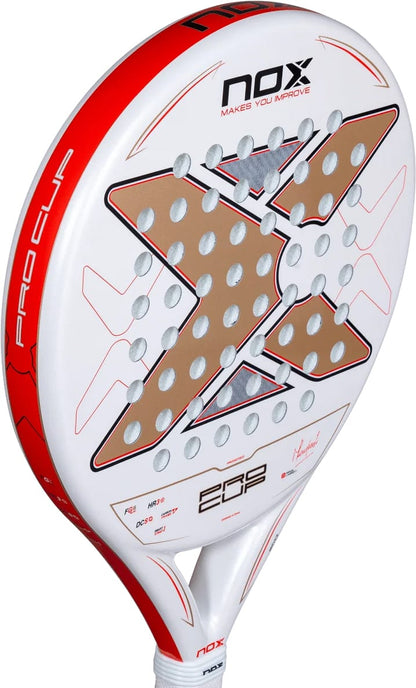 NOX ML10 Pro Cup Coorp By Miguel Lamperti 2027 padel racket with a round white frame, a large metallic bronze X-shaped design in the center, and red accents along the edges.
