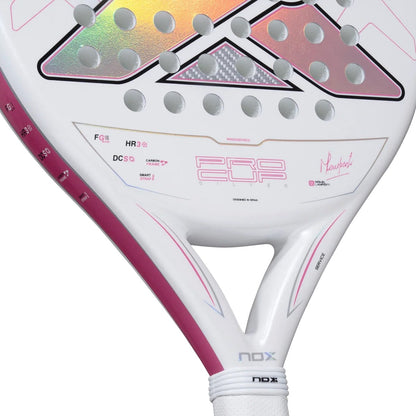 White NOX ML10 Pro Cup Silver By Miguel Lamperti 2027 padel racket with pink accents, a holographic pattern on the face, a perforated head, and a white grip.
