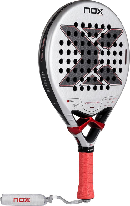 Silver and black NOX Ventus Control 3K By Miguel Lamperti 2027 Padel Racket featuring a large X-shaped cutout pattern, red neck accents, and a red handle grip with a wrist strap.