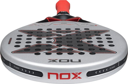 NOX Ventus Control 3K By Miguel Lamperti 2027 padel racket featuring a black X-shaped pattern across the perforated surface and a red handle grip.