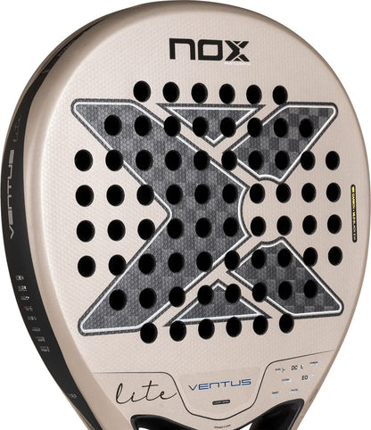 Round beige NOX Ventus Hybrid 12K Lite 2027 padel racket with a large central X-shaped pattern of perforations and printed technical specifications.