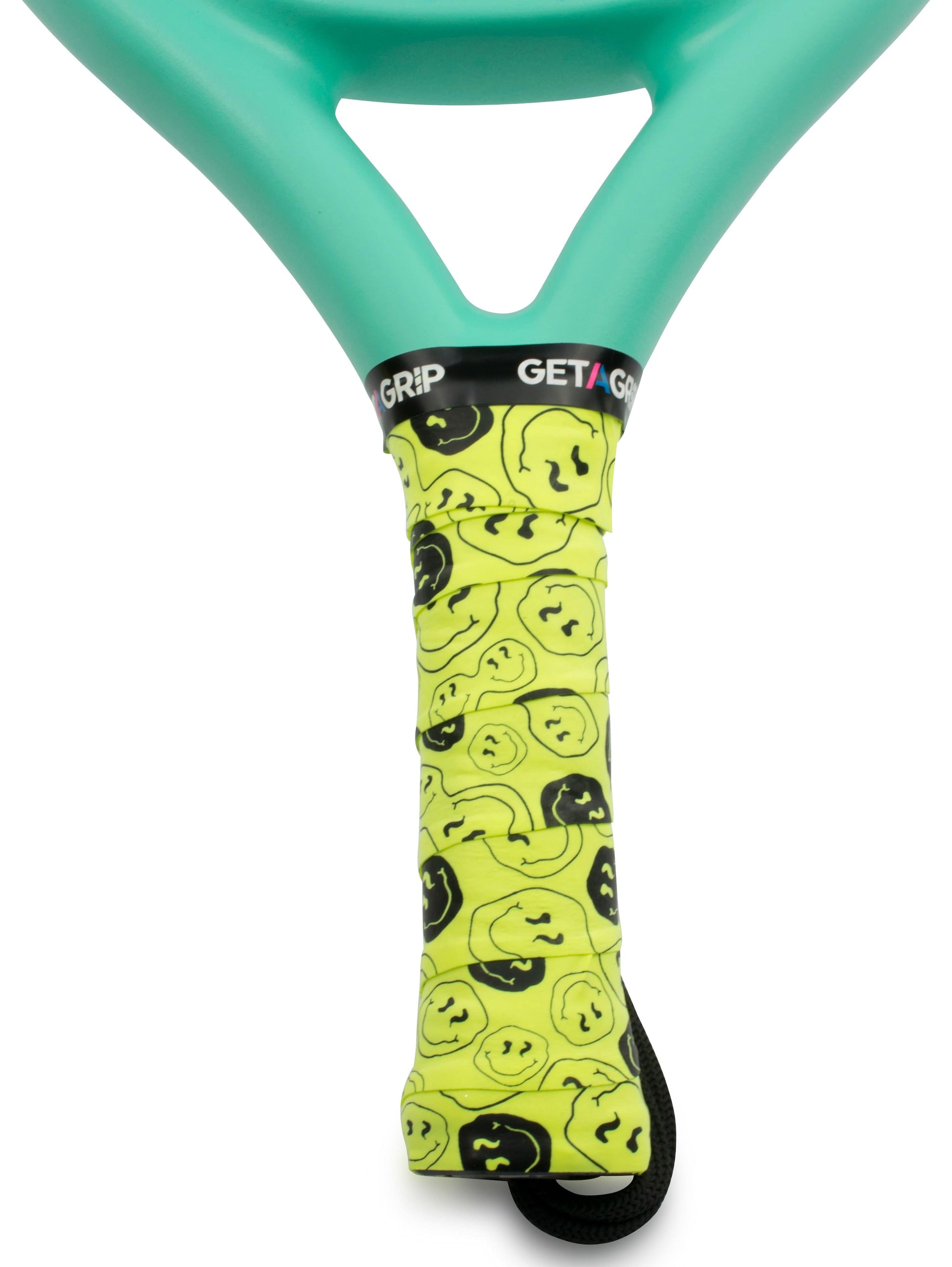 A teal tennis racket with the Get a Grip Padel Overgrip - Smiley by Get A Grip in yellow, featuring black outlined smiling and frowning faces. The top of the grip shows "GET A GRIP" in bold black and white lettering.
