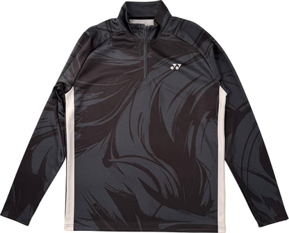 The Yonex YML6 Unisex Padel Midlayer - Storm is a long-sleeve athletic pullover by Yonex, featuring a quarter-zip design. It comes in black with dark abstract patterns, accented by white stripes on the sides and a small white logo on the left chest.