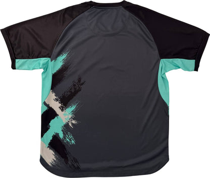 The Yonex YTM13 Men’s Padel T-Shirt - Storm features short sleeves with black accents, a dark gray back, teal side panels, and striking teal, cream, and black brushstroke designs on the lower left side. This Yonex shirt is the perfect choice for men who want both comfort and style during padel matches.