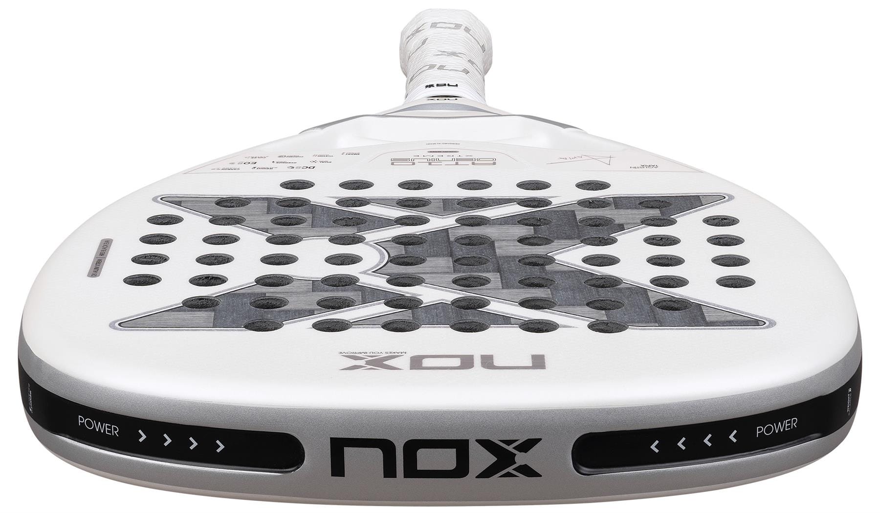 A close-up of the NOX AT10 Genius Attack 12K Alum Extrem By Agustín Tapia 2026 Padel Racket, showing its perforated surface, bold NOX branding on the lower edge, and “POWER” text on both sides of the rim for ultimate power play.