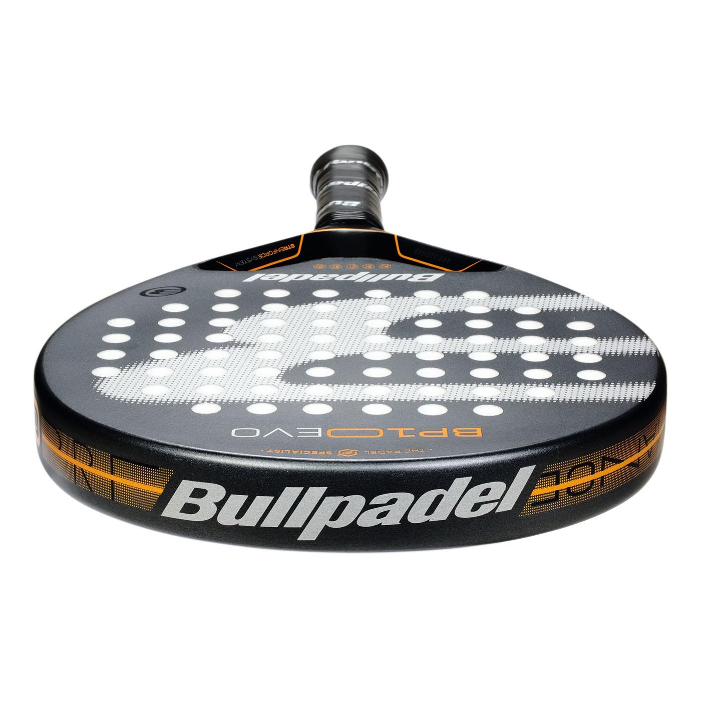 The Bullpadel BP10 EVO 2025 Padel Racket features a sleek black/grey design with a round head, white holes, and striking orange accents. Made with Polyglass fiberglass and the STReinforce system for durability, it includes the brand name on the bottom edge and a black handle grip.