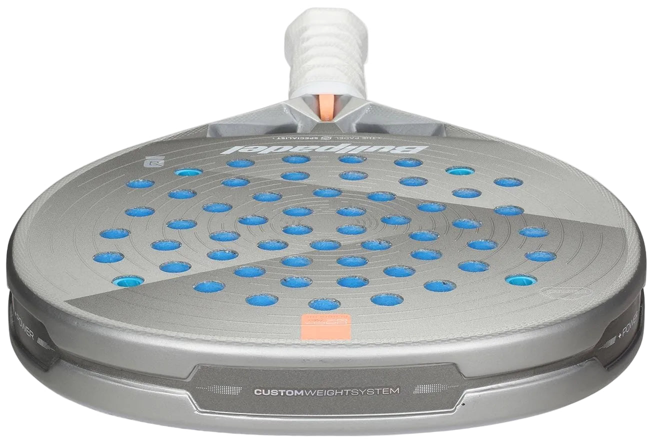 A close-up of the Bullpadel Hack 04 Hybrid Cloud 2026 Padel Racket shows its silver hybrid shape, blue holes, white handle wrap, and "CUSTOM WEIGHT SYSTEM" text near the frame.