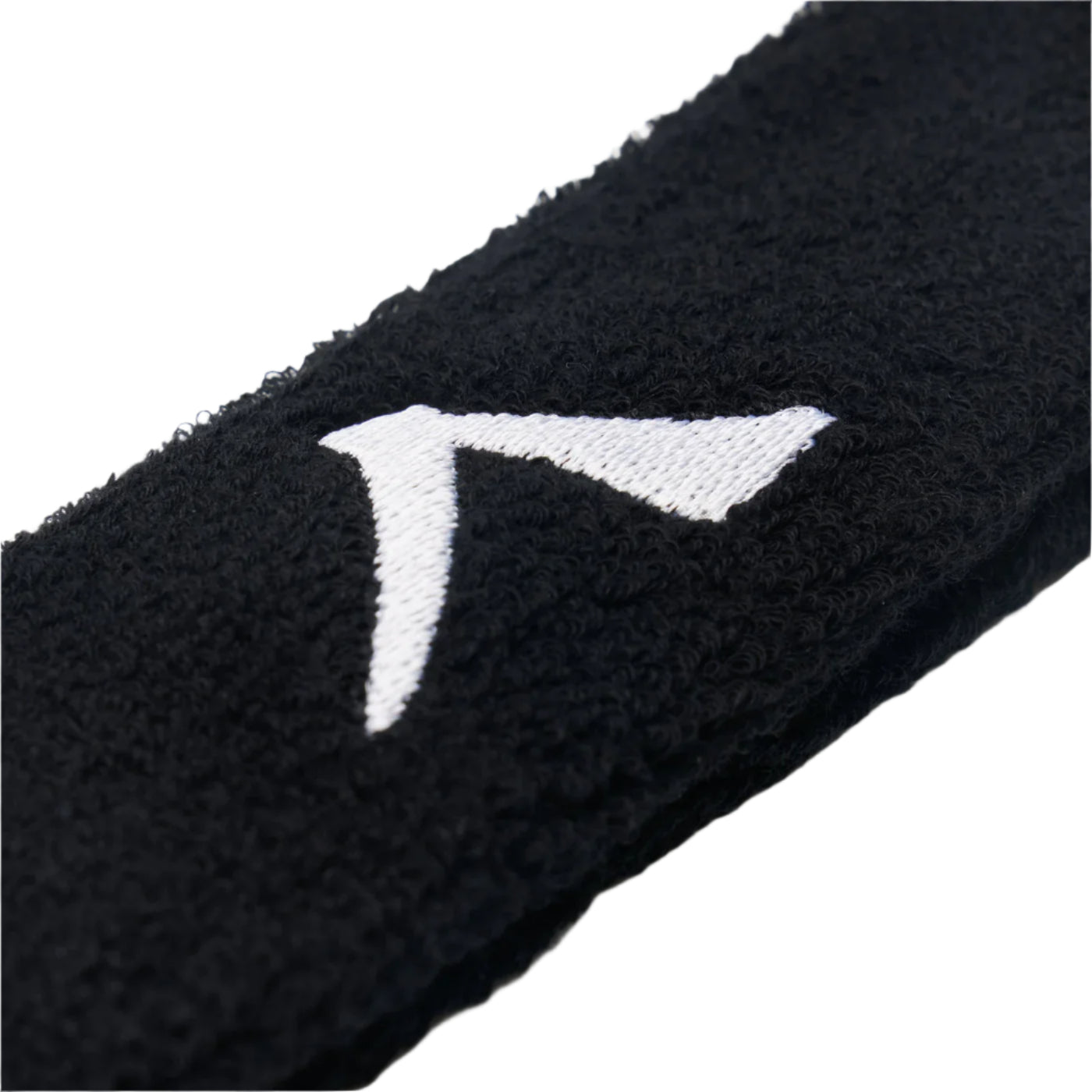 Close-up of the black Kanso 4cm Headband fabric with a textured design and an embroidered white, angular symbol. The soft, woven material offers comfort for any clothing or accessory.