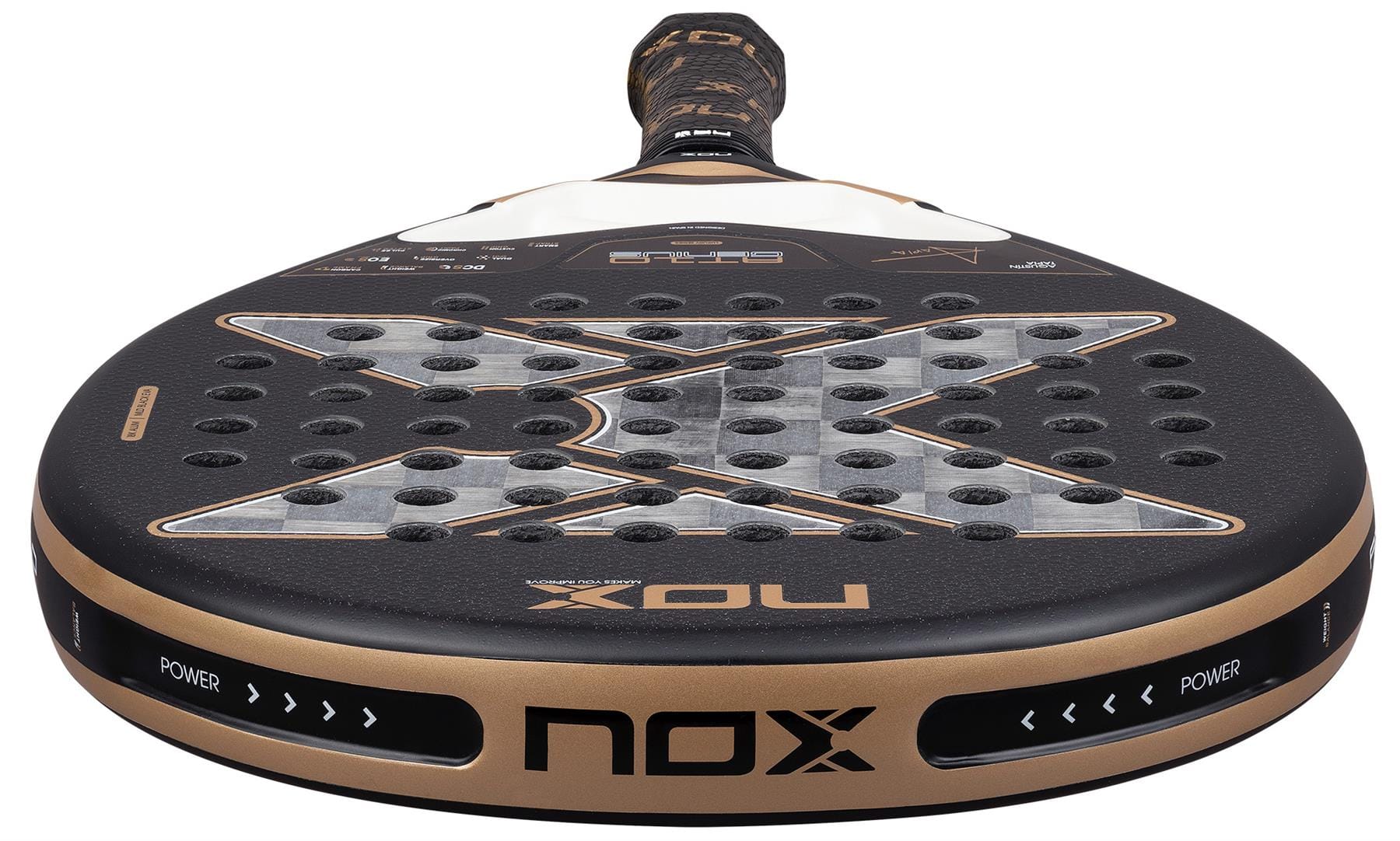 Close-up of the NOX AT10 Genius 18K Alum By Agustín Tapia 2026 Padel Racket in black and gold by NOX, featuring a Dual Spin surface, large "X" design, multiple holes, and "POWER" printed on the edge near the handle.