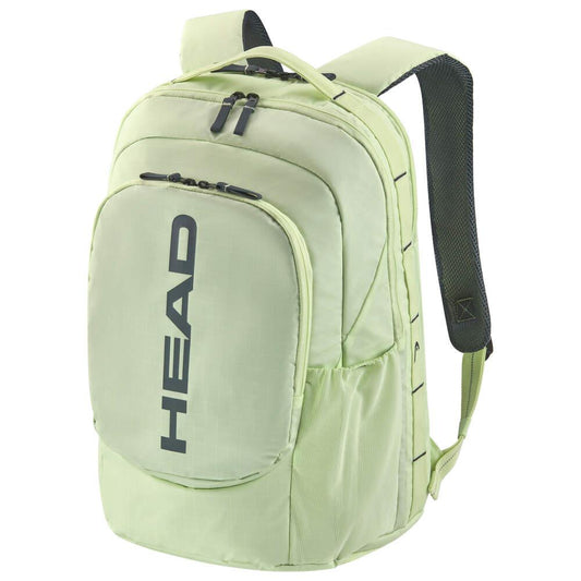 The HEAD Pro 30L Padel Backpack - LLAN, in a light green hue, is made from sustainable ripstop fabric and showcases the brand name "HEAD" prominently in bold black lettering. The backpack is designed with multiple compartments, a top handle, and padded shoulder straps to ensure maximum comfort.