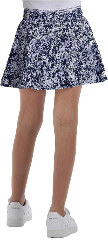 A person is shown from the back wearing the Bullpadel Parasil Women's Padel Skirt in Deep Ocean, paired with white sneakers and a white waistband, against a plain background.