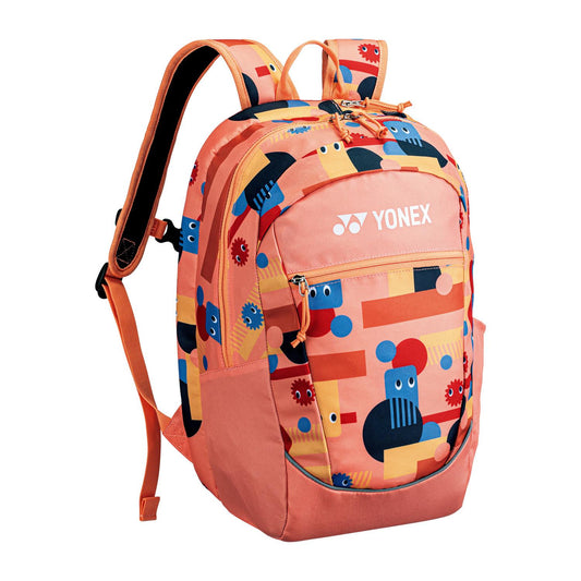 The Yonex 22512 Junior Padel Backpack - Coral is a colorful choice for young players with its vibrant abstract design in blue, red, and orange geometric shapes. It features adjustable straps, a zipper closure, and "Yonex" printed in white.