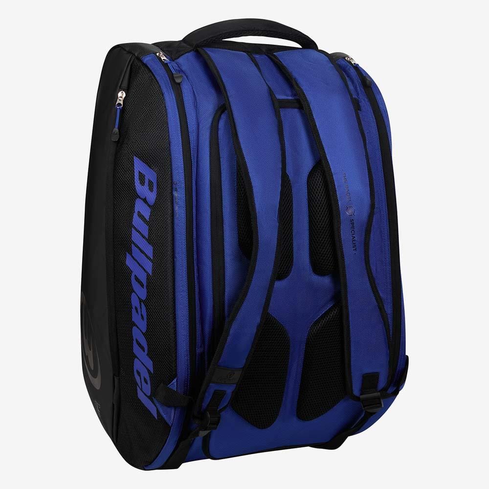 The Bullpadel BPP26002 Vertex Padel Bag - Geo Blue by Bullpadel stands upright with padded shoulder straps, side zippers, ventilation mesh, and a top handle—ideal as a stylish sports gear bag against a plain white background.