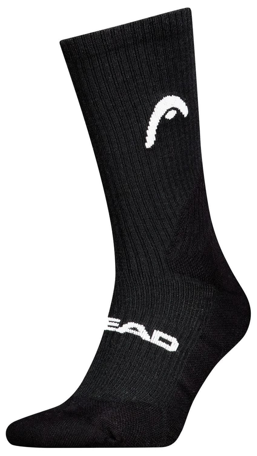 The HEAD Crew Padel Sock in black features a ribbed texture, moisture-wicking fabric, a white curved logo near the ankle, and "HEAD" in white across the top of the foot.