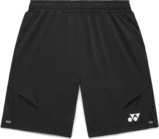 The Yonex 15239YX Knit Men's Padel Shorts in black feature an elastic waistband, side pockets, and a small white Yonex logo on the lower right leg. These lightweight shorts offer a simple, sporty design ideal for active play.