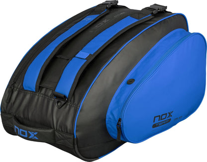 The NOX ML10 Team Padel Racket Bag in black and blue features multiple zippered compartments and adjustable shoulder straps, perfect for carrying padel rackets and sports gear.