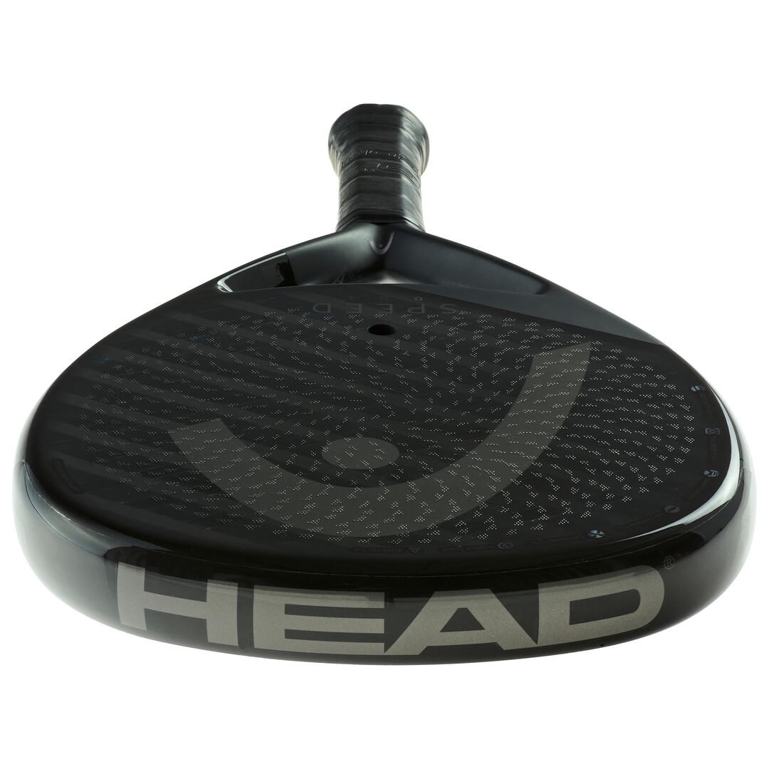 Close-up of the HEAD Speed One 2025 Padel Racket - Black, showing its Auxetic 2.0 technology for better control, textured surface for Extreme Spin, and prominently displayed brand name "HEAD." The handle features a comfortable grip.