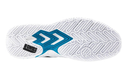 The image shows the underside of a K-Swiss Tura Team Mens Padel Shoe, featuring a durable white and blue geometric tread with chevrons and circular grooves for improved court grip. A black "K-SWISS" logo is positioned near the heel, making it ideal for traction-focused padel shoes.