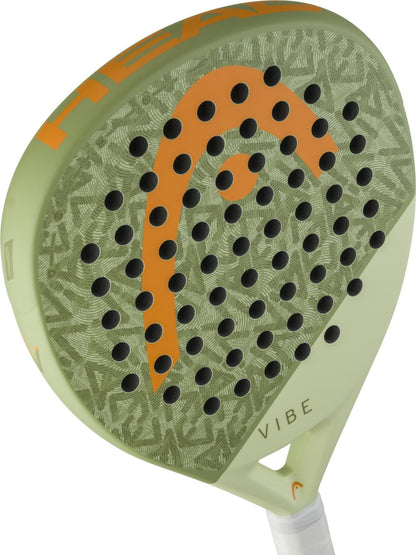 A close-up of the HEAD Vibe 2026 Green / Orange Padel Racket shows its fibreglass hitting surface, light green face with an orange HEAD logo, black perforations, and a white handle.