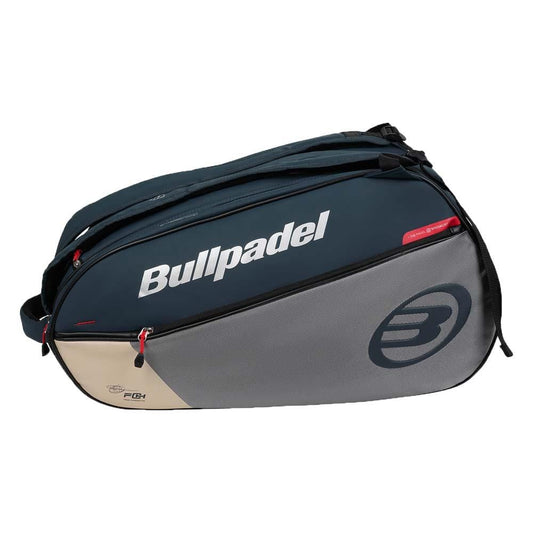 The Bullpadel BPP26017 Neuron Padel Bag in grey features a large "B" logo, white Bullpadel branding, red zippers, multiple compartments including thermal racket sections, and a shoulder strap.