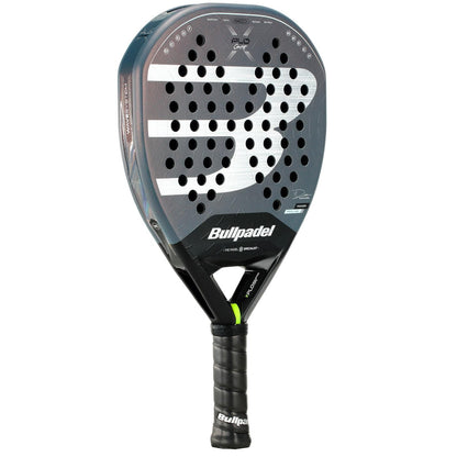 The Bullpadel XPLO Comfort 2026 Padel Racket - Grey features a large "B" logo, circular holes on the surface, and a black grip handle, delivering explosive power and comfort in every game.