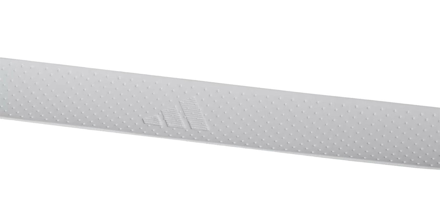 A close-up of a white adidas Padel Overgrips (3 Pack) strip, featuring small bumps, micro-perforations, and an embossed triangle logo for comfort and performance, shown against a plain white background.