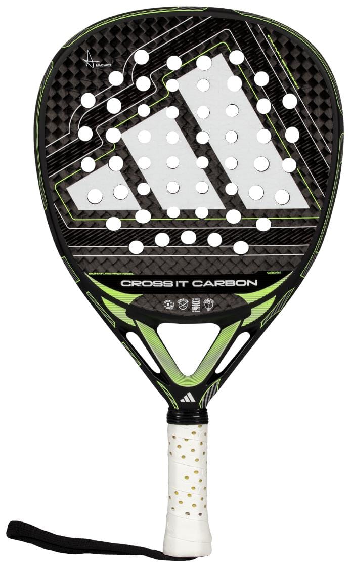 The adidas Cross It Carbon 2026 Padel Racket in black and green features a white perforated face, a white grip with gold dots, carbon fibre build, black wrist strap, and visible adidas branding.