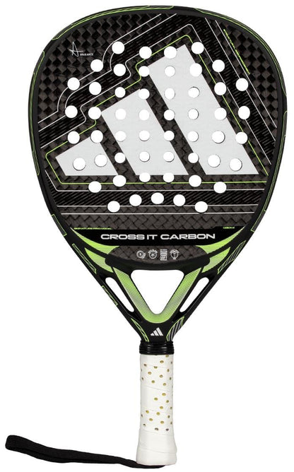 The adidas Cross It Carbon 2026 Padel Racket in black and green features a white perforated face, a white grip with gold dots, carbon fibre build, black wrist strap, and visible adidas branding.