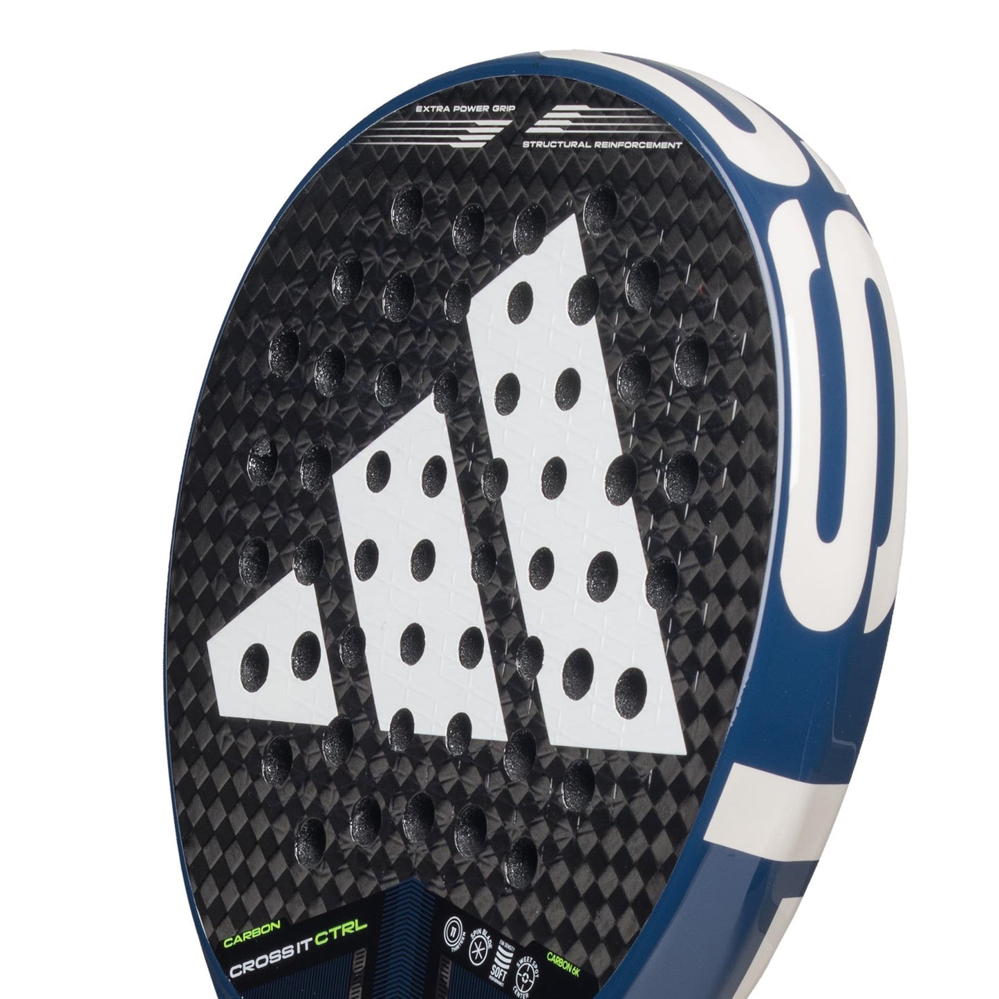 Close-up of the ADIDAS Cross It Carbon CTRL Padel Racket in black/blue, featuring a textured surface with circular perforations and a triangular white logo. Emphasizing control and precision, it is labeled "Carbon 6K" and "Crossfit Ctrl" near the handle.