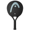 Introducing the HEAD One Ultralight Padel Racket - Black: This padel racket boasts a sleek black textured surface, enhanced by a light blue graphic design and a small white circle near the center. Its ultralight handle is wrapped in black grip tape, featuring "ONE" and "ULTRALIGHT" inscriptions that echo its modern aesthetic appeal.