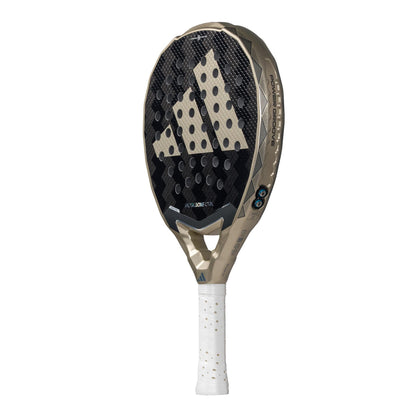 This adidas Metalbone CTRL 3.4 Padel Racket in gold boasts an octagonal structure and a large geometric logo. The handle is wrapped in white perforated grip tape, while its modern design features a patterned surface and angled edges for ideal weight and balance.