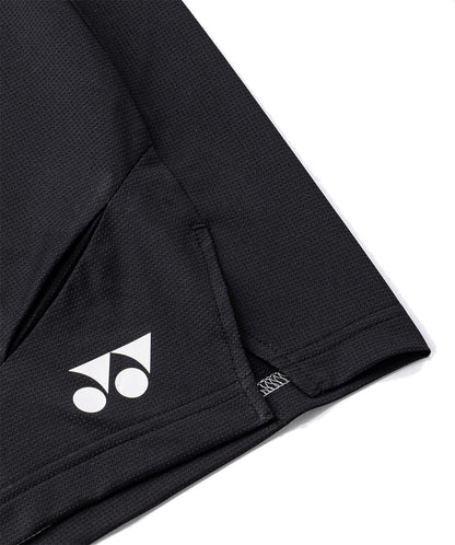 Close-up of Yonex 15239YX Knit Men's Padel Shorts in black, featuring a white Yonex logo near the hem and detailed seams—lightweight athletic shorts designed for top performance on the court.