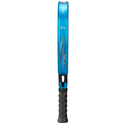 A blue Bullpadel Vertex 05 GEO 2026 padel racket stands upright, front edge forward, with a black and gray textured grip handle and a modern high-performance design.