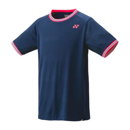 The Yonex 10578 Crew Neck Men's Padel T-Shirt in Indigo Marine features a subtle swirl pattern with red and white trim on the collar and sleeves. Equipped with VeryCool technology for superior UV reduction, it also includes a small red logo on the left chest.