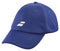 The Babolat Pure Logo Cap - Sodalite Blue is a lightweight, eco-friendly blue baseball cap made from recycled polyester. It features a front white abstract logo, a curved brim, and visible stitching on the panels.