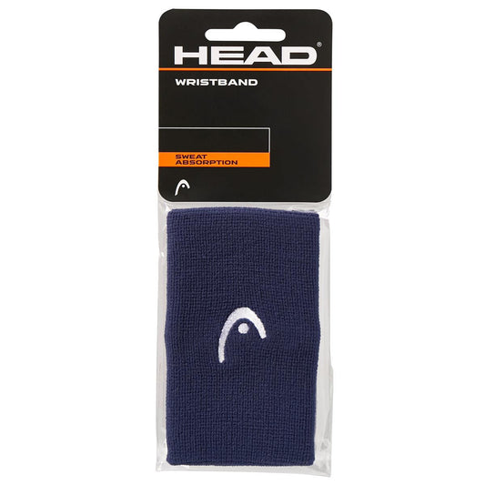 The HEAD 5" Padel Wristband - Navy, crafted to keep you dry during rallies, features a dark blue design with the brand logo. It is packaged in clear wrapping beneath a stylish black and orange header, showcasing its excellent sweat-absorbing qualities.