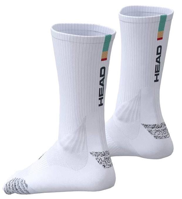 The HEAD Colour Crew Padel Socks in white/turquoise feature a ribbed texture, black "HEAD" logo on the sides, colorful stripes at the top, Nanofront yarn for better grip, and gray-speckled soles.