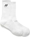 The Yonex 19256EX Sport Crew Padel Socks (3 Pack) in white feature a black Yonex logo near the top. These moisture-wicking socks, shown side by side on a white background, offer athletic comfort and style.