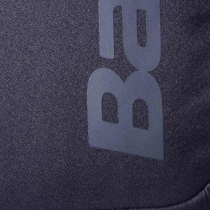 Close-up of the dark gray fabric from the Babolat Court Lite Padel Backpack - Black by Babolat, featuring a textured surface and partially visible "BA" lettering in a lighter gray shade.