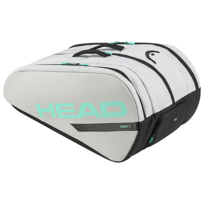 The HEAD Tour Padel Bag L - CCTE sports a white, black, and turquoise design with prominent branding. This elongated bag features a backpack carry system, includes a shoulder strap, holds rackets and equipment, and protects gear with its CCT+ climate control.