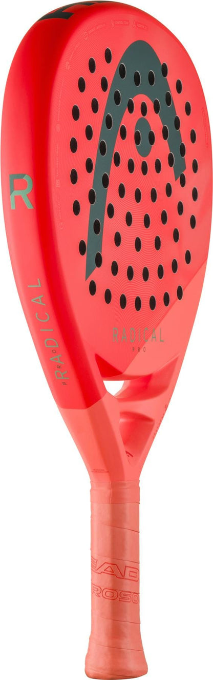 A vibrant orange and green HEAD Radical Pro 2026 Padel Racket features black perforations, a bold black logo on the face, "RADICAL" along the side, and a matching orange grip for superior style and control.