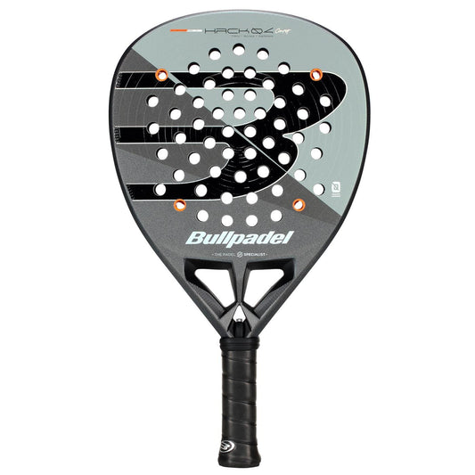 The Bullpadel HACK 04 Comfort 2026 Padel Racket – Grey features a dynamic power design with a large "B" logo, multiple round holes, grey and black colors, and a black grip handle.